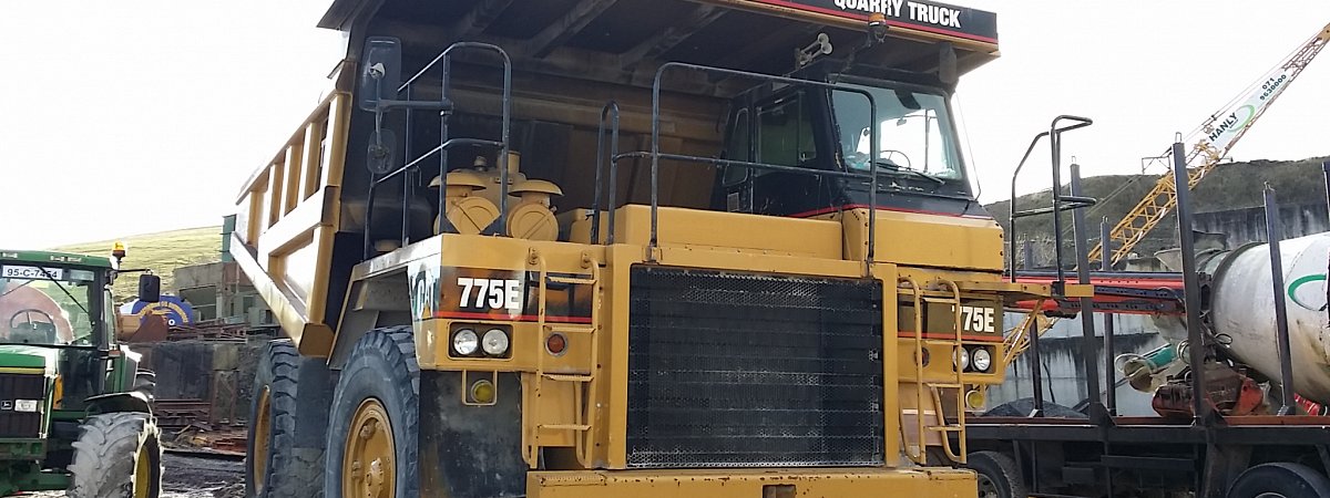 Caterpillar 775E Quarry Truck sold and shipped to a client in East Africa. CAT 775E Quarry Truck